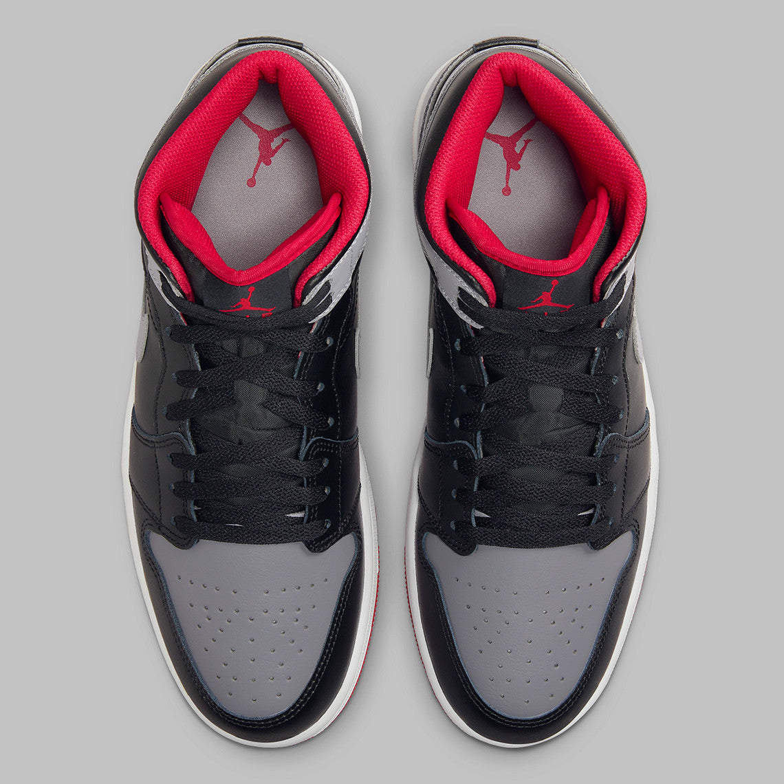 Air Jordan 1 Mid Black Cement Carries On Tradition